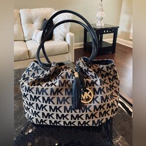 Michael Kors Coated Canvas Bucket Drawstring Bag.